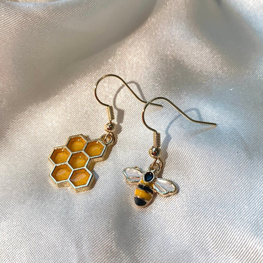Cool quirky yellow and black gold bee drop dangle earrings with yellow honey comb