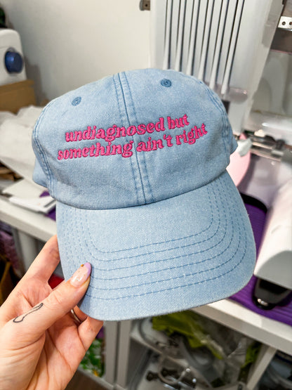 Undiagnosed But Something Ain't Right embroidered baseball cap