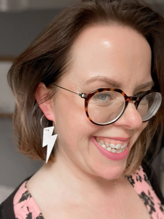Metallic silver cork lightning bolt hoop earrings