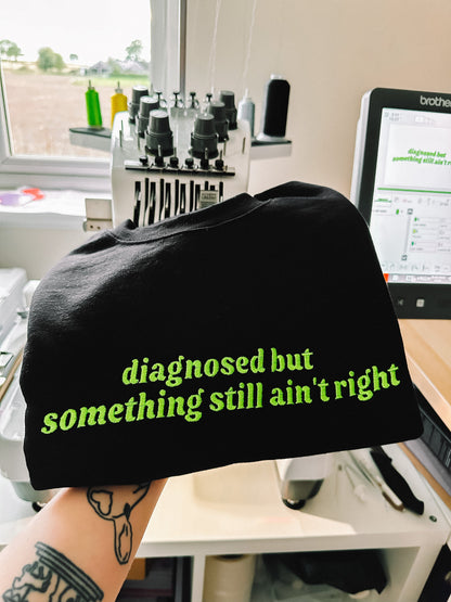 Diagnosed But Something Still Ain’t Right embroidered sweatshirt