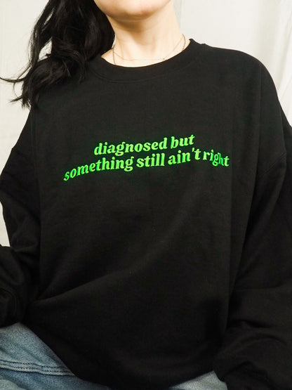 Diagnosed But Something Still Ain’t Right embroidered sweatshirt