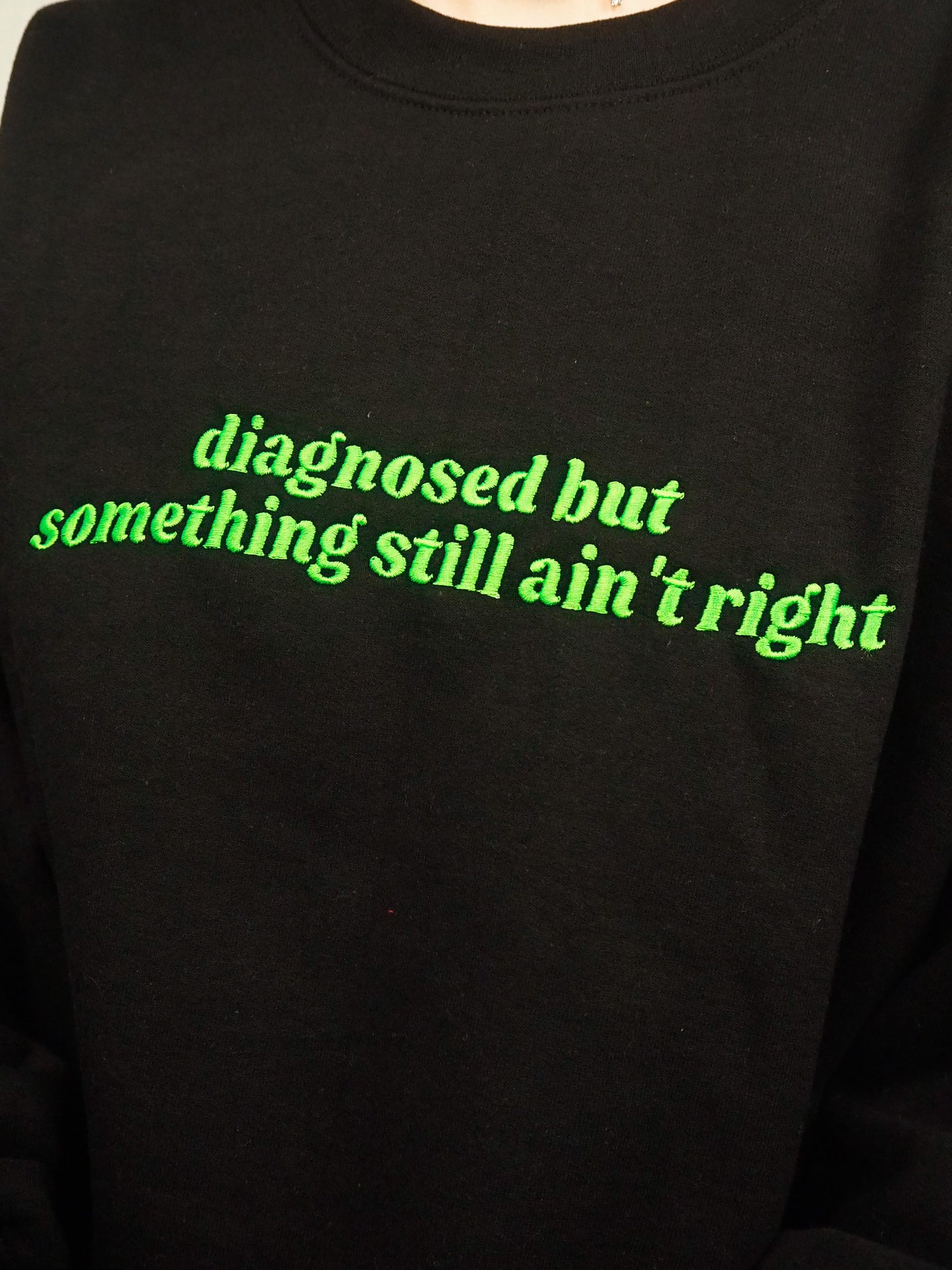 Diagnosed But Something Still Ain’t Right embroidered sweatshirt