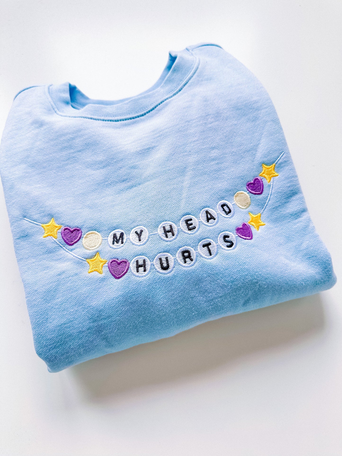 My Head Hurts Friendship Bracelet embroidered sweatshirt