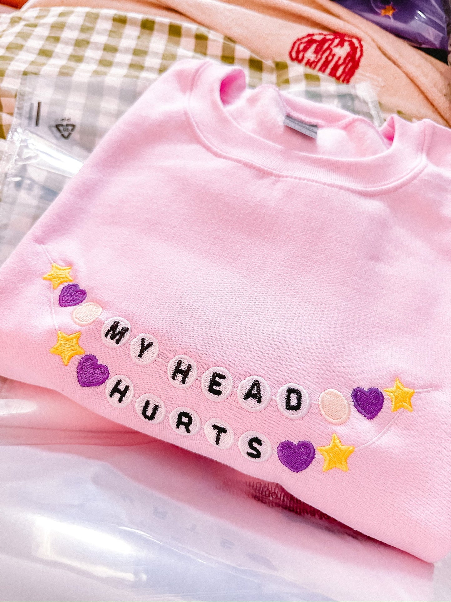 My Head Hurts Friendship Bracelet embroidered sweatshirt