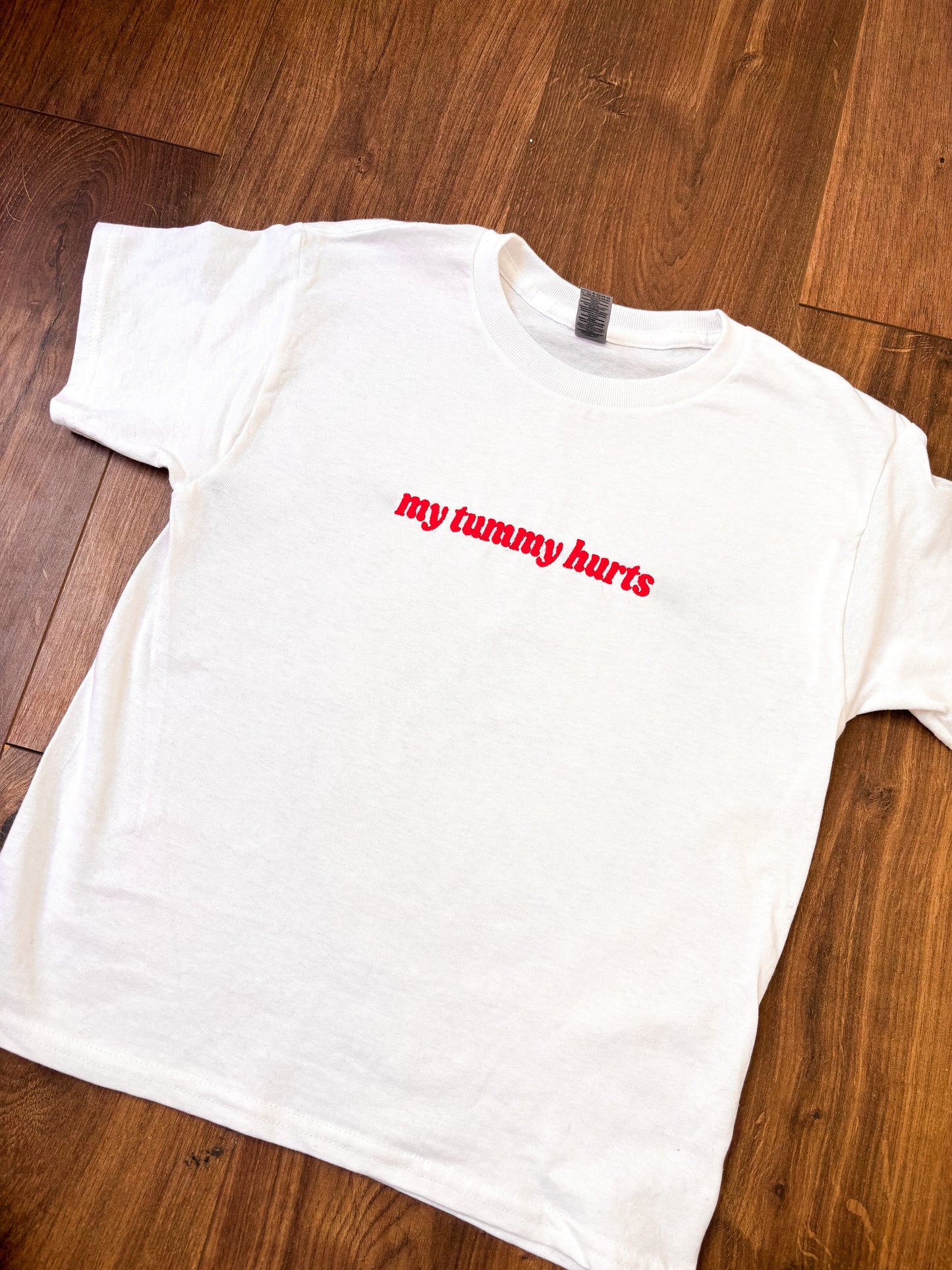 My Tummy Hurts embroidered baby tee