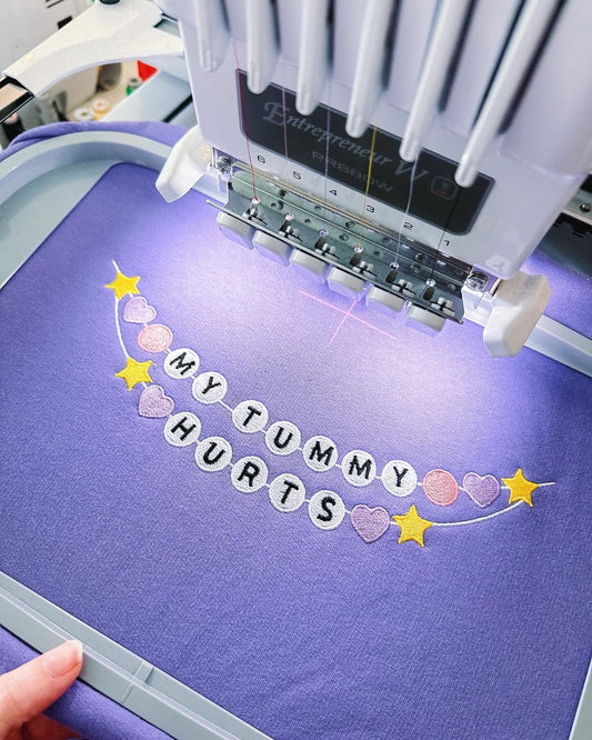 My Tummy Hurts Friendship Bracelet embroidered sweatshirt