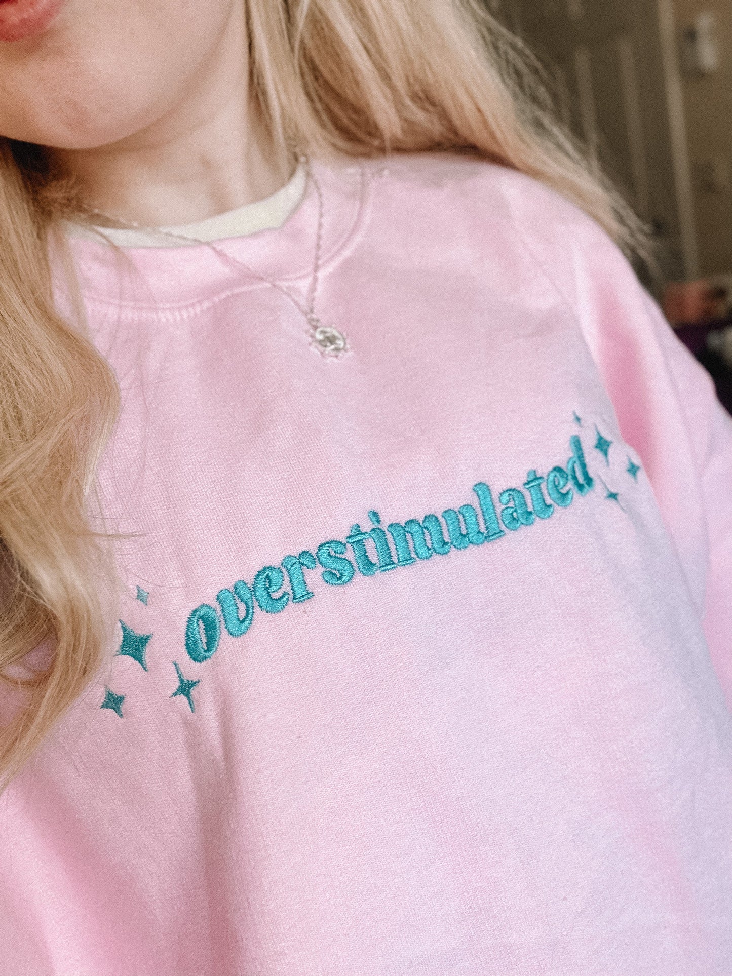 Overstimulated embroidered sweatshirt
